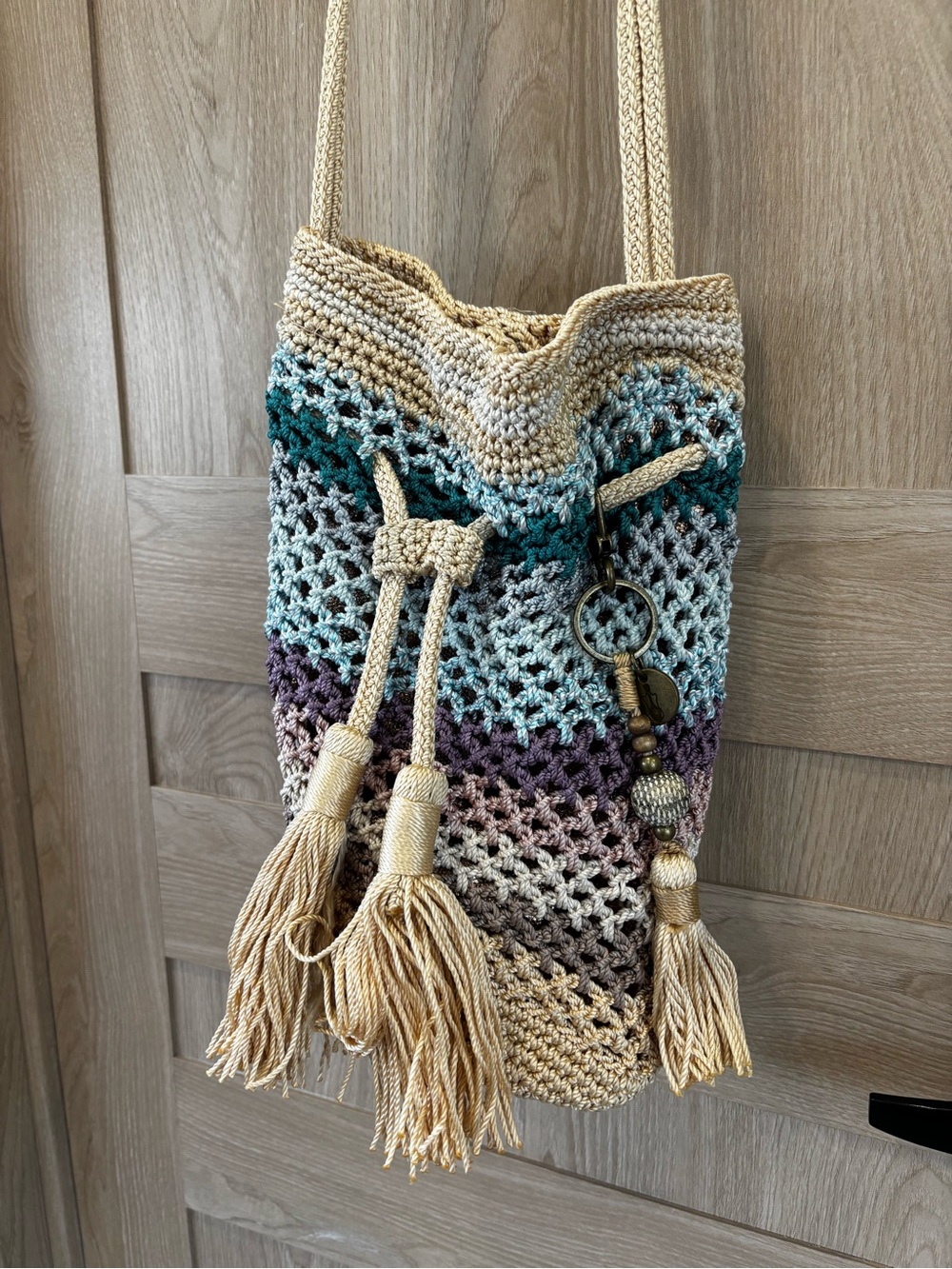 The Sak Sayulita Drawstring Bucket Bag Crossbody Crochet
